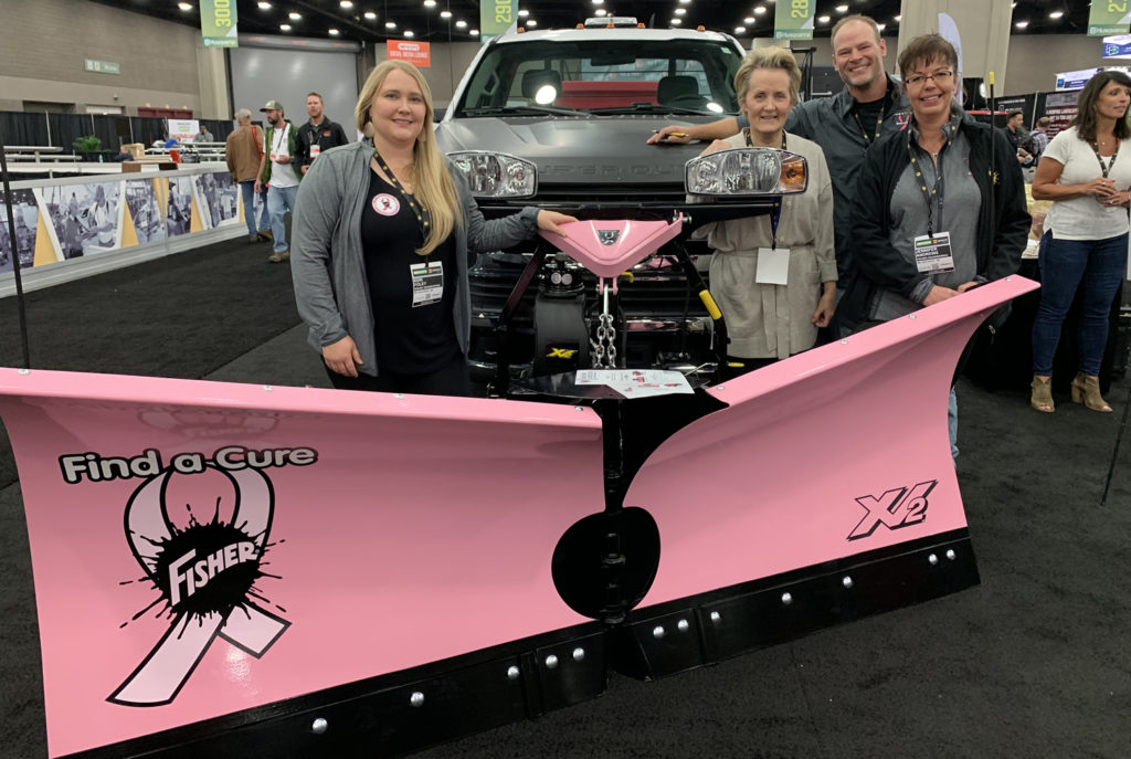 Pictured in the image (left to right): Keri Foley, Fisher; Lynda Weeks, Executive Director, Susan G. Komen Kentucky; Jeff Kopp, SnowEx; and Jennifer Andrews, Fisher. 